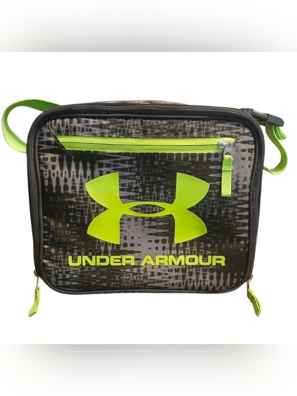 Under Armour Scrimmage lunch box featuring a broken grid design in lime green. 